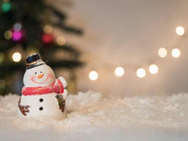 istock snowman jolly to smile celebrate on bokeh background 846842508