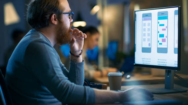 istock Professional Statistician Works with Graphics on His Personal Computer. In the Background His Colleagues Working. 846845526