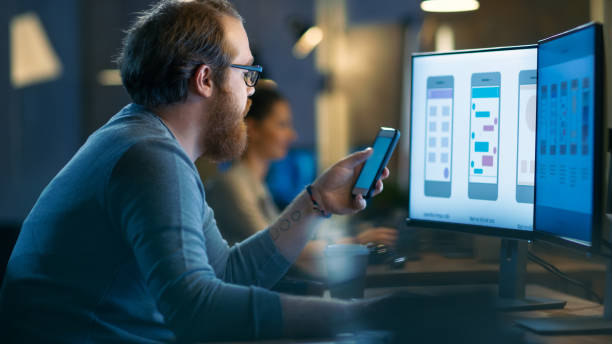 istock Professional Statistician Works with Graphics on His Personal Computer. In the Background His Colleagues Working. 846845536