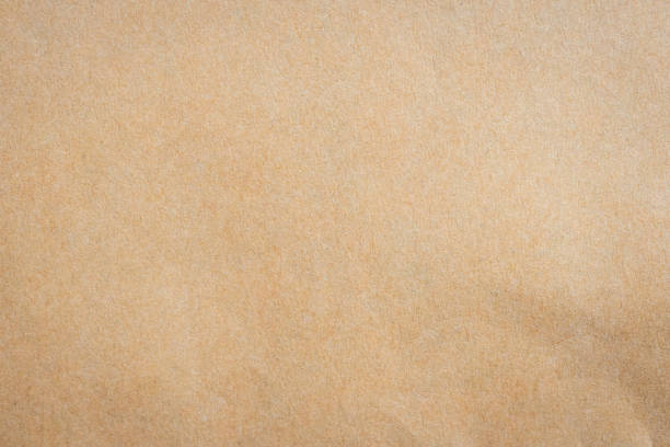istock close up kraft brown paper texture and background. 846852042