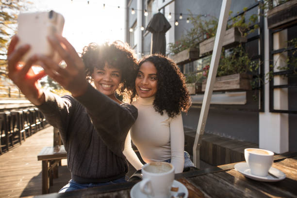 istock Two young women taking a selfie 846859864