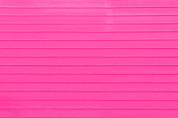 Pink wooden background with copy space.