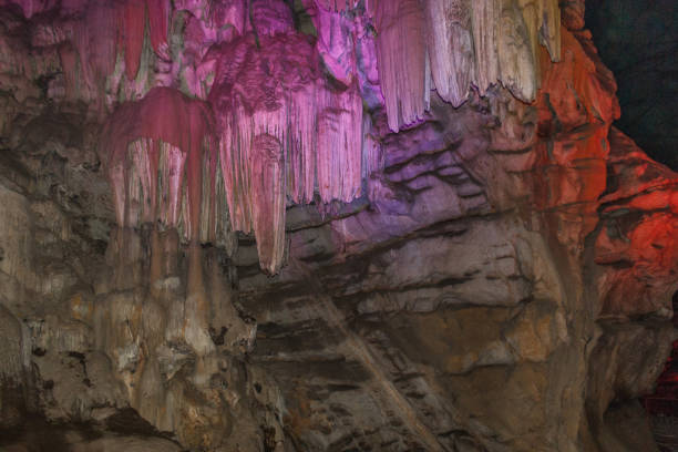 Inside view of borra cave with colorful lights, Araku Valley, Visakhapatnam Andhra Pradesh, India, March 04 2017