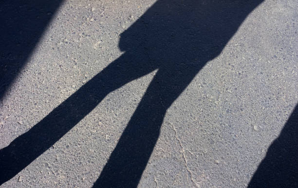 istock Abstract Shadow of Pedestrain Walking 846882062