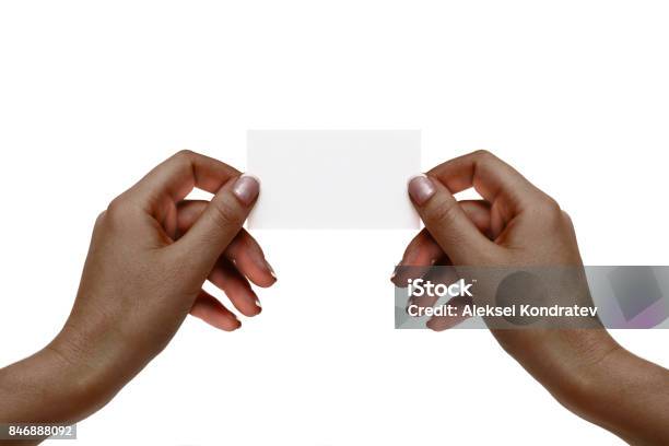 Isolated African Female Hands Hold White Card On A White Background Stock Photo - Download Image Now