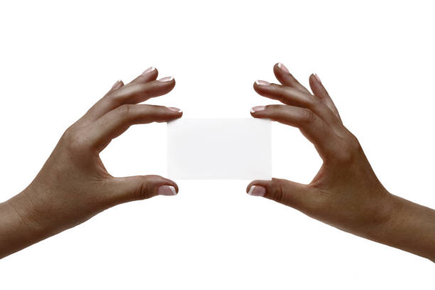 istock African female hands hold white card on a white background. 846888182