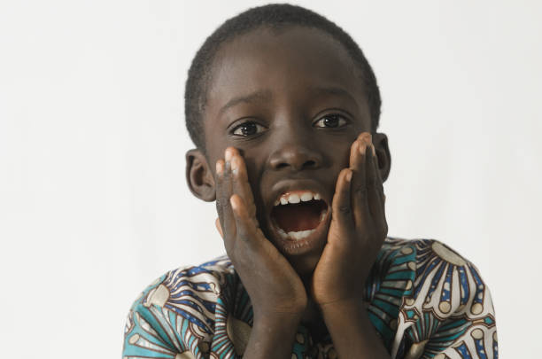 istock Little black boy surprised and excited with white isolated background 846892074