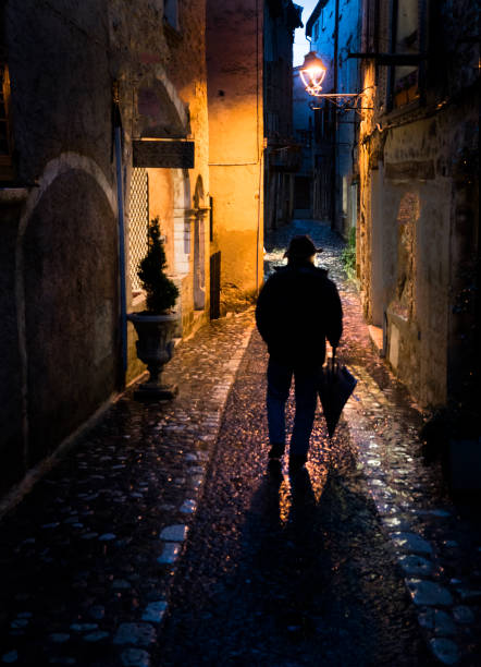 istock Ominous dark street in a medieval village 846897810
