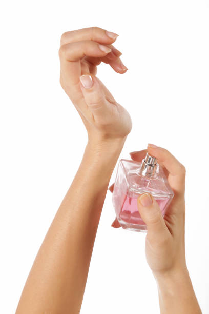 istock Woman applying perfume on her wrist 846903990
