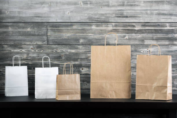 istock Shopping bags on table 846917360