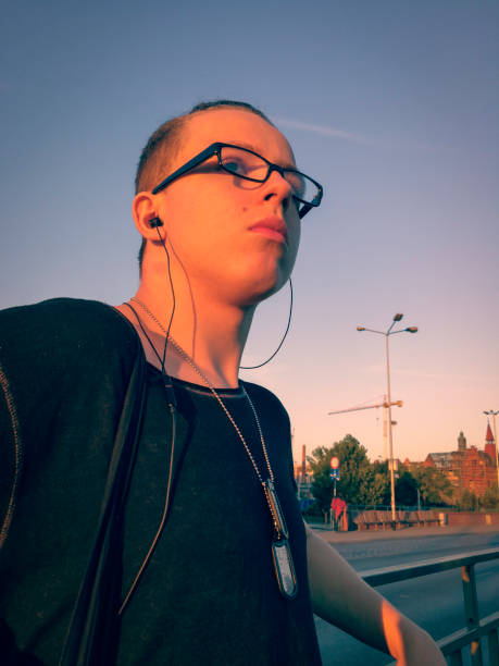 istock young boy waiting for the tram 846917364