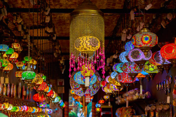 Turkish or Moroccan glass tea light hanging lantern on display at Camden Market Turkish or Moroccan glass tea light hanging lantern on display at Camden Market in London camden stables market stock pictures, royalty-free photos & images