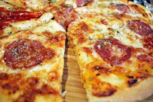 istock Soft focus closeup pizza whole wheat pan on wooden dish 846927378
