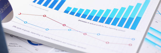 istock Financial statistics documents on clipboard pad at office table closeup 846928456