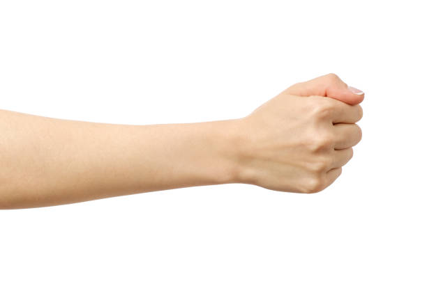 istock Woman's hand with incorrect fist gesture isolated on white 846928982
