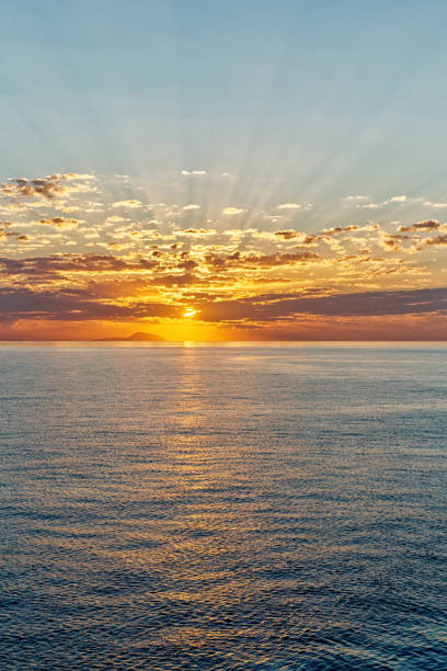istock beautiful seascape with deep ocean waters and sunrise cloudscape 846932886