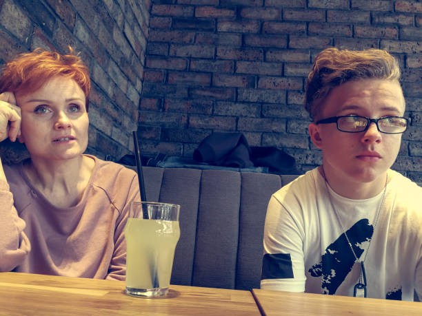 istock mother with son in a restaurant 846935898