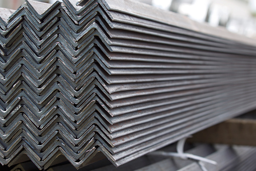 Metal profile angle in packs at the warehouse of metal products, Russia