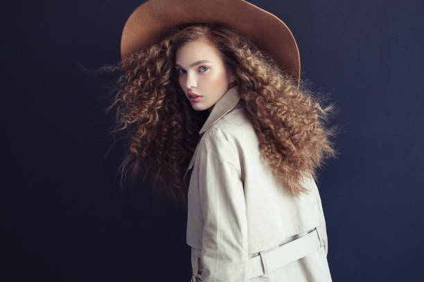 istock Beautiful girl with make-up wearing coat and hat 846948794