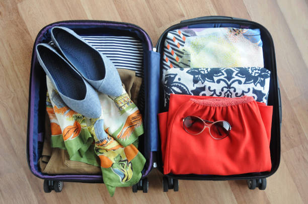 istock Packed Suitcase of Women's Clothing 846953898