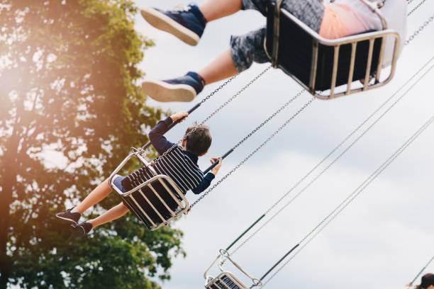 istock Happy child boy having fun in amusement park. 846954548