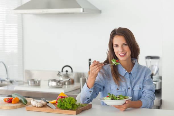 istock Woman eating a vegetarian salad 846975812