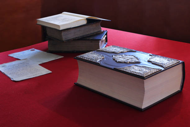 istock ancient books on the vintage table 846979294