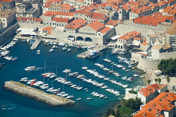 A view of the old town of Dubrovnik with the sea port in Croatia.\
