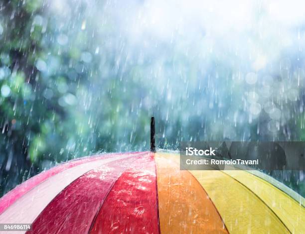 Rain On Rainbow Umbrella Stock Photo - Download Image Now - Rain, Umbrella, April