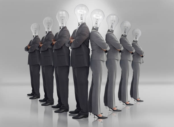 istock Business team with light bulb heads 846993340