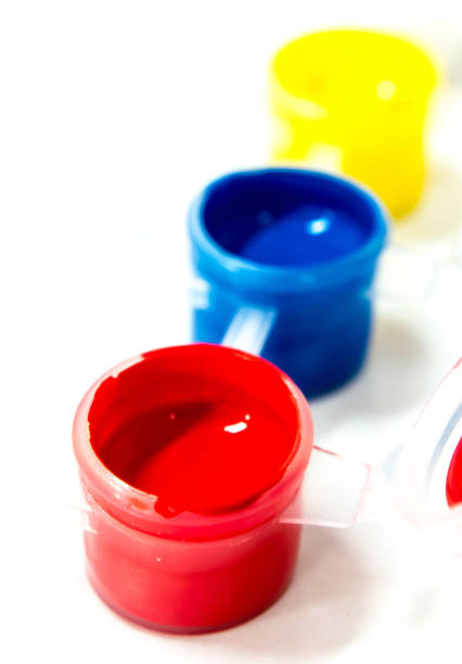 istock Small cup of primary colors acrylic paint 847008382