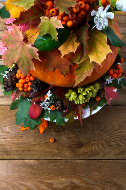 istock Thanksgiving table centerpiece with fall leaves and seeds, copy space 847022956