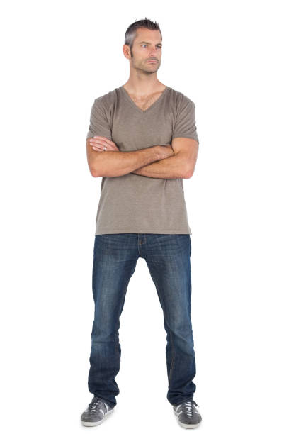istock A man standing with arms crossed 847023396
