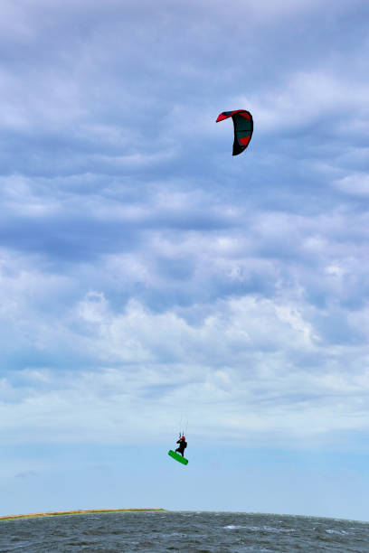 istock Kite Surfing on waves at sea in summer. 847025698