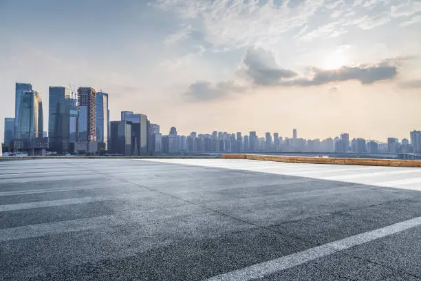 Photo of Panoramic skyline and buildings with empty road，chongqing city，china