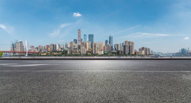 istock Panoramic skyline and buildings with empty road，chongqing city，china 847032874