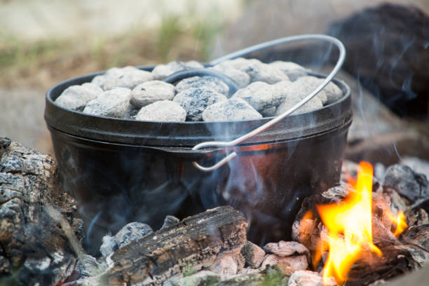 Dutch Oven Close Up Dutch over in a campfire. cauldron photos stock pictures, royalty-free photos & images