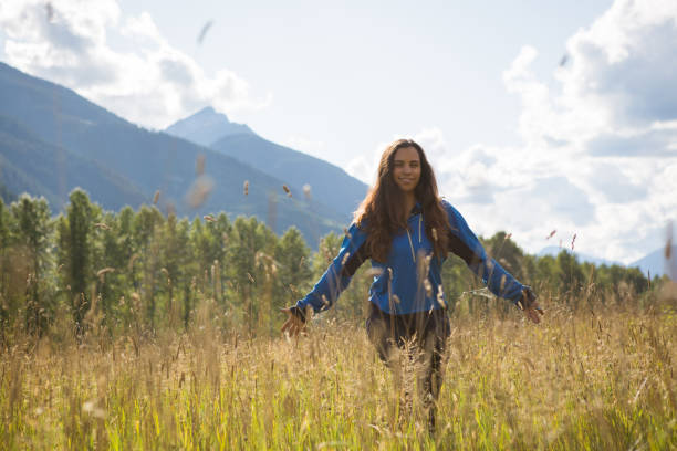 istock Indigenous Canadian woman walks through a field 847040302