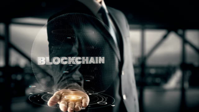 Blockchain with hologram businessman concept