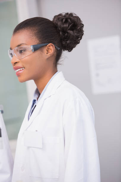 istock Smiling scientist wearing protective glasses 847043160