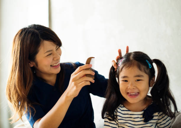 istock Mother and daughter playing together 847043312