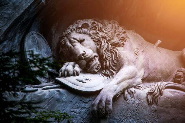 Dying lion monument in Lucerne stock photo