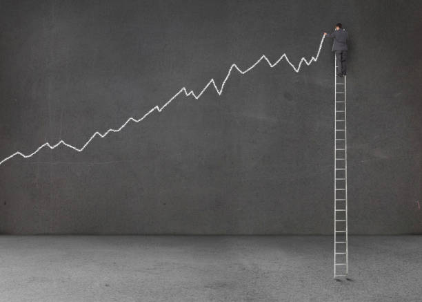 istock Businessman standing on a giant ladder 847044102