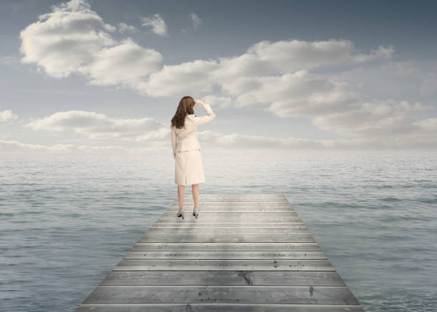 istock Businesswoman standing on a bridge 847046288