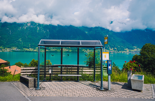 Bus stop with Thunersee lake in background