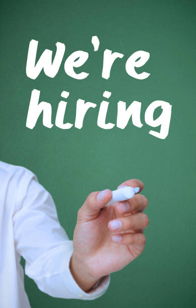 istock Businessman writing with a marker were hiring 847053152