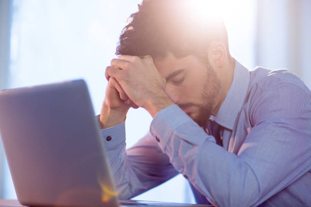 istock Businessman using laptop at desk 847076436