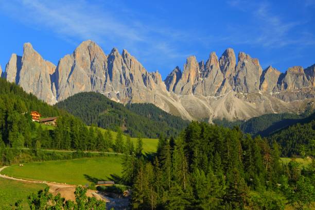 istock Santa Magdalena village in front of Dolomites Group, 847076440