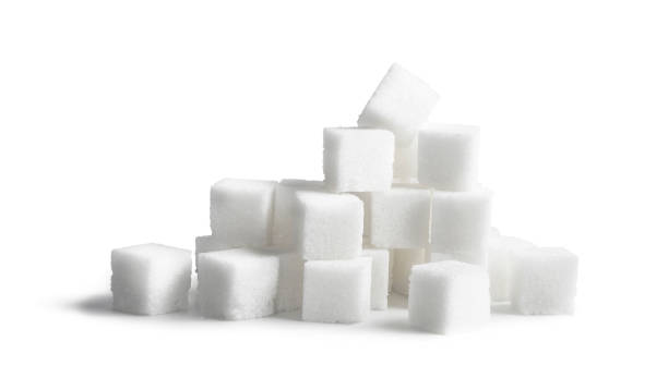 sugar cubes isolated on white background - sugar imagens e fotografias de stock