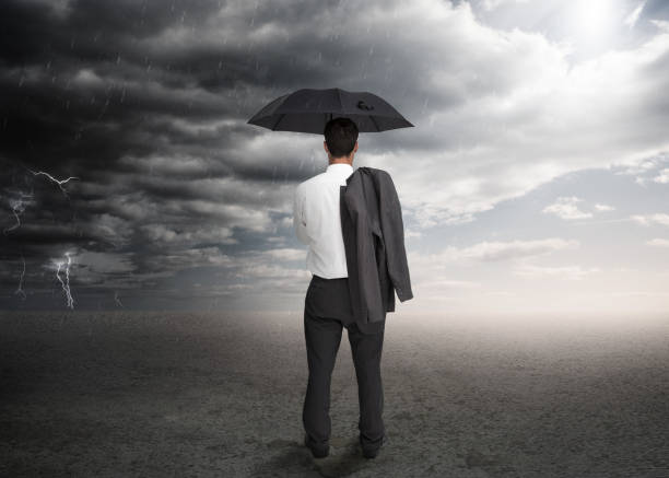 istock Businessman holding an umbrella 847084226